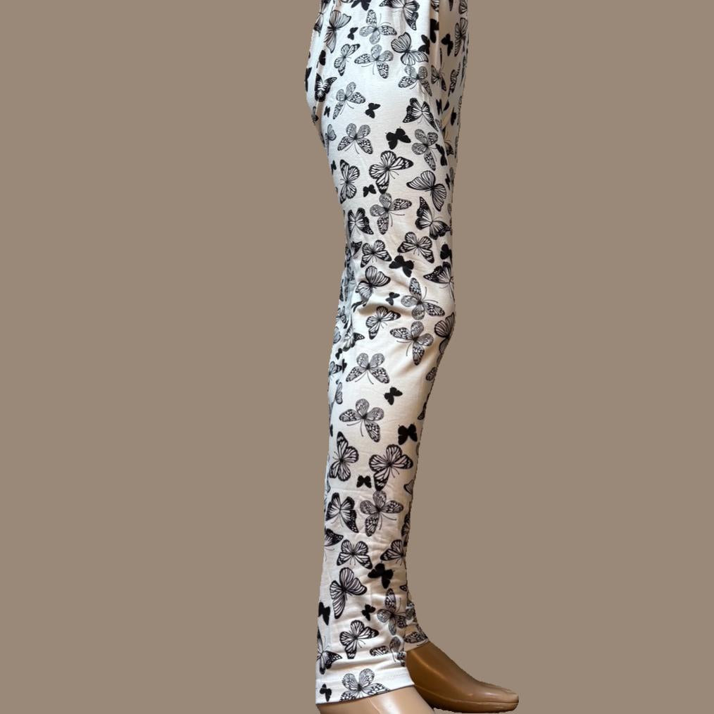 White leggings with black butterfly design, full length