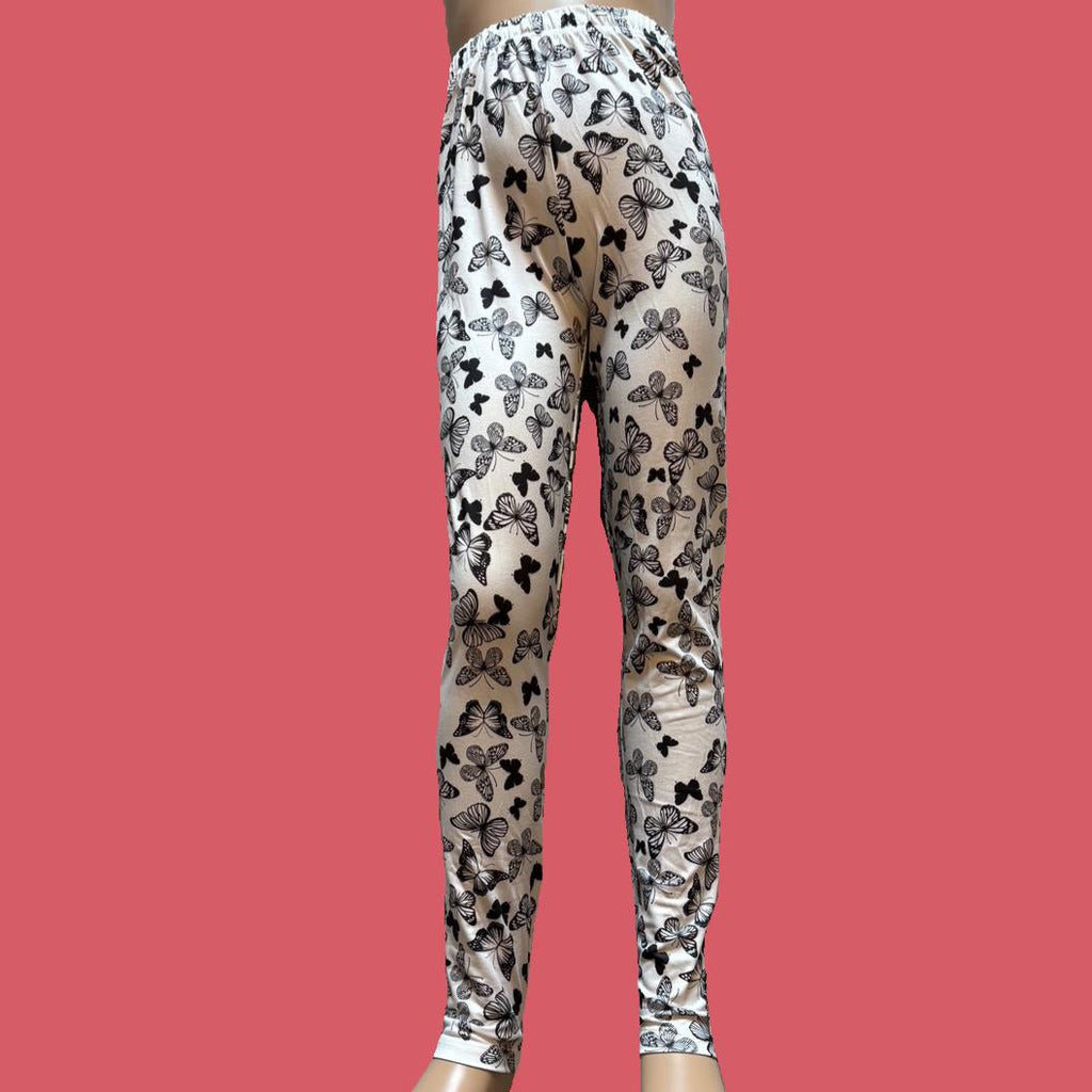White leggings with black butterfly design, full length