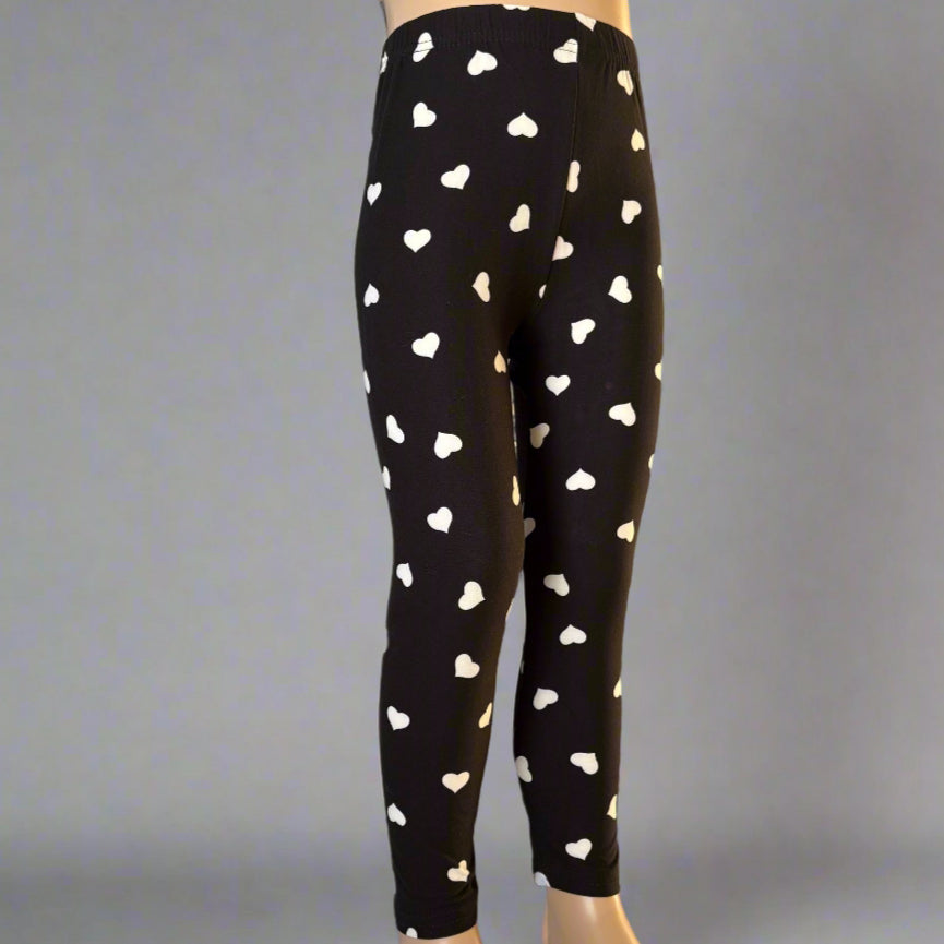 Black leggings with white hearts design