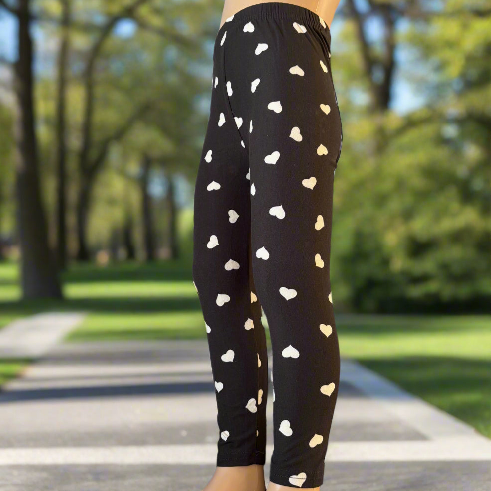 Black leggings with white hearts design
